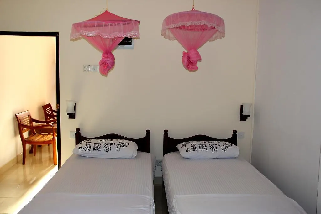 فندق مبيت وإفطار نيجومبو Holiday Guest Inn